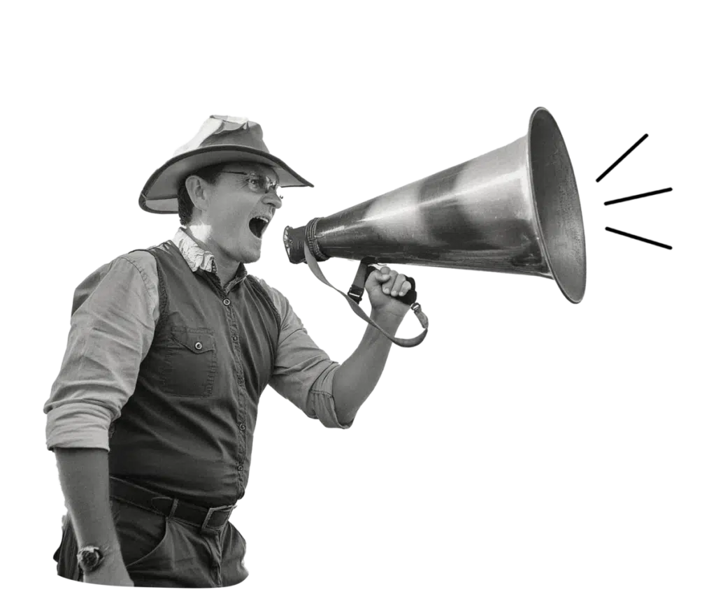 Man met megafoon – Man met hoed en bril roept in een grote metalen megafoon